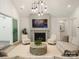 Cozy living room featuring a fireplace and large windows at 8115 Farm Crossing Ln # 3, Huntersville, NC 28078