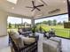Covered outdoor patio featuring comfortable seating and a scenic backyard view at 8115 Farm Crossing Ln # 3, Huntersville, NC 28078