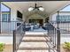 Covered brick patio with outdoor seating and stylish design, leading up to the main home at 8115 Farm Crossing Ln # 3, Huntersville, NC 28078