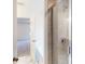 Bright bathroom featuring a glass shower with tiled walls and marble flooring at 649 Kitfox Nw Dr, Concord, NC 28027