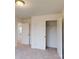 Bedroom with plush carpeting, featuring a closet with sliding doors at 649 Kitfox Nw Dr, Concord, NC 28027