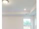 Bright bedroom featuring tray ceiling and plush carpeting at 649 Kitfox Nw Dr, Concord, NC 28027