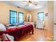 Bright bedroom featuring a comfortable bed and ample closet space at 713 Perkins St, Lowell, NC 28098