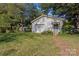 Detached garage with additional storage shed in backyard at 713 Perkins St, Lowell, NC 28098