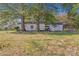 View of detached garage and additional storage building at 713 Perkins St, Lowell, NC 28098