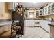 White kitchen cabinets, stainless steel appliances at 713 Perkins St, Lowell, NC 28098