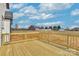 Outdoor deck with wooden railings, providing a perfect spot to enjoy the backyard view at 2025 Parks Rd, Salisbury, NC 28147