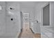 Spacious bathroom featuring marble shower, vanity, and natural light from the window at 2025 Parks Rd, Salisbury, NC 28147