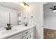 Bathroom features a double vanity with black hardware and mirrors at 2025 Parks Rd, Salisbury, NC 28147