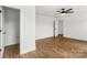 Spacious bedroom with hardwood floors and neutral paint throughout at 2025 Parks Rd, Salisbury, NC 28147