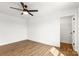 Bedroom features hardwood floors and a ceiling fan at 2025 Parks Rd, Salisbury, NC 28147