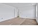 Bedroom featuring wood floors, white trim, and neutral-colored walls at 2025 Parks Rd, Salisbury, NC 28147