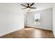 Bedroom features hardwood floors, neutral paint, and a window with natural light at 2025 Parks Rd, Salisbury, NC 28147