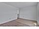 A light-filled bedroom featuring wood floors and white trim at 2025 Parks Rd, Salisbury, NC 28147