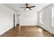 Bedroom features hardwood floors, neutral paint, and a window with natural light at 2025 Parks Rd, Salisbury, NC 28147