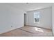 A room with white walls and a window to provide natural light at 2025 Parks Rd, Salisbury, NC 28147