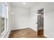 Walk-in closet with built-in shelving and an open view to the bathroom at 2025 Parks Rd, Salisbury, NC 28147