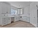 Bright kitchen featuring white cabinets, quartz countertops, and stainless steel appliances, perfect for cooking and entertaining at 2025 Parks Rd, Salisbury, NC 28147