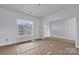 Bright living room with a picture window providing natural light and beautiful views to the outside at 2025 Parks Rd, Salisbury, NC 28147