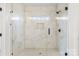 Close up on a glass enclosed shower with marble tiling and built-in niche at 2025 Parks Rd, Salisbury, NC 28147