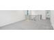 Neutral hallway features carpet and iron railing with view to outside at 317 Miramar Dr, York, SC 29745