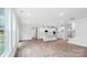 Open living space features hardwood floors, recessed lighting, and connects seamlessly to the modern kitchen at 317 Miramar Dr, York, SC 29745