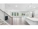 Open concept living room with fireplace, hardwood floors, and seamless transition to the kitchen at 317 Miramar Dr, York, SC 29745