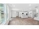 Bright, open living room with hardwood floors, recessed lights, and a smooth transition to the kitchen at 317 Miramar Dr, York, SC 29745