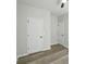 Bedroom with neutral walls, ceiling fan and wood-look flooring at 414 Clinton Ave, Lancaster, SC 29720