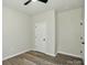Bedroom features neutral walls, modern ceiling fan and wood-look flooring at 414 Clinton Ave, Lancaster, SC 29720