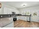 Modern kitchen with stainless steel appliances, granite countertops, and ample cabinet space at 414 Clinton Ave, Lancaster, SC 29720