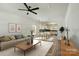 Bright open-concept living room and kitchen with modern decor and plenty of natural light at 414 Clinton Ave, Lancaster, SC 29720