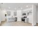Newly constructed kitchen featuring stainless steel appliances, white subway tiles, and light-colored cabinets at 602 Meadow Ave, Spencer, NC 28159