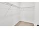 Empty walk-in closet with carpeted floors and wire shelving at 602 Meadow Ave, Spencer, NC 28159
