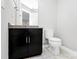 Basement bathroom with granite vanity and toilet at 11712 Blessington Rd, Huntersville, NC 28078