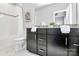 Bathroom with granite countertop, dark brown vanity, and shower/tub combo at 11712 Blessington Rd, Huntersville, NC 28078
