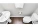 Small, simple bathroom with pedestal sink and toilet at 11712 Blessington Rd, Huntersville, NC 28078