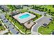 Aerial view of community pool, playground, and parking at 11712 Blessington Rd, Huntersville, NC 28078