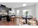 Modern kitchen with dark cabinetry, granite countertops, and stainless steel appliances at 11712 Blessington Rd, Huntersville, NC 28078