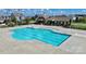 Community lap pool with adjacent clubhouse and lounge area at 11712 Blessington Rd, Huntersville, NC 28078