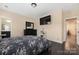 Bedroom featuring dark wood floors, neutral paint, and a comfortable layout at 16827 Monocacy Blvd, Huntersville, NC 28078