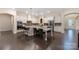 Well-equipped kitchen with granite countertops, white cabinetry, stainless steel appliances, and breakfast bar at 16827 Monocacy Blvd, Huntersville, NC 28078