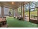Relax in the covered patio with outdoor seating and backyard views at 16827 Monocacy Blvd, Huntersville, NC 28078
