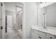 Bright bathroom features a tub shower, neutral wall, and a sink with white cabinetry at 552 Fern Hill Rd # 21, Mooresville, NC 28117