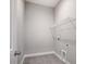 Laundry room with tile flooring, wire shelving and utility connections at 552 Fern Hill Rd # 21, Mooresville, NC 28117