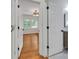 Bedroom featuring hardwood floors, a ceiling light and windows providing natural light at 1003 Woodland Dr, Gastonia, NC 28054