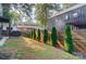 Green backyard with privacy fence and well-maintained landscaping at 2107 W Trade St, Charlotte, NC 28216