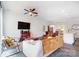 Open concept living room featuring modern decor, hardwood floors, and lots of natural light at 2107 W Trade St, Charlotte, NC 28216