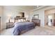 Spacious bedroom with wood furniture and neutral decor at 2402 Paddlers Cove Dr, Clover, SC 29710