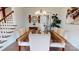 Elegant dining room features a rustic wood table and six chairs at 2402 Paddlers Cove Dr, Clover, SC 29710